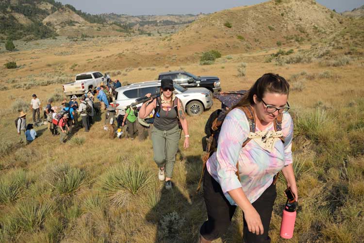 heather chadwick with other dig field school participants in the field