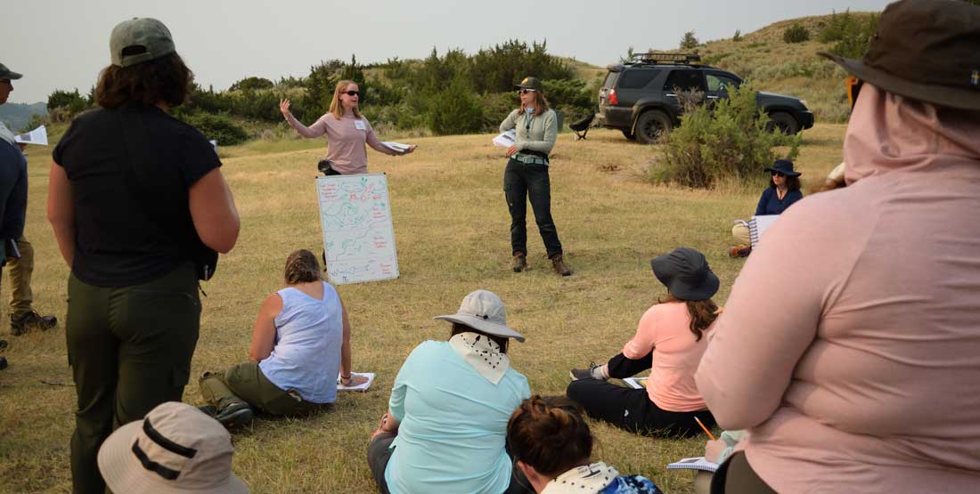 DIG Instructor Dr. Paige K. Wilson Deibel introduces participants to the geology of Hell Creek.  