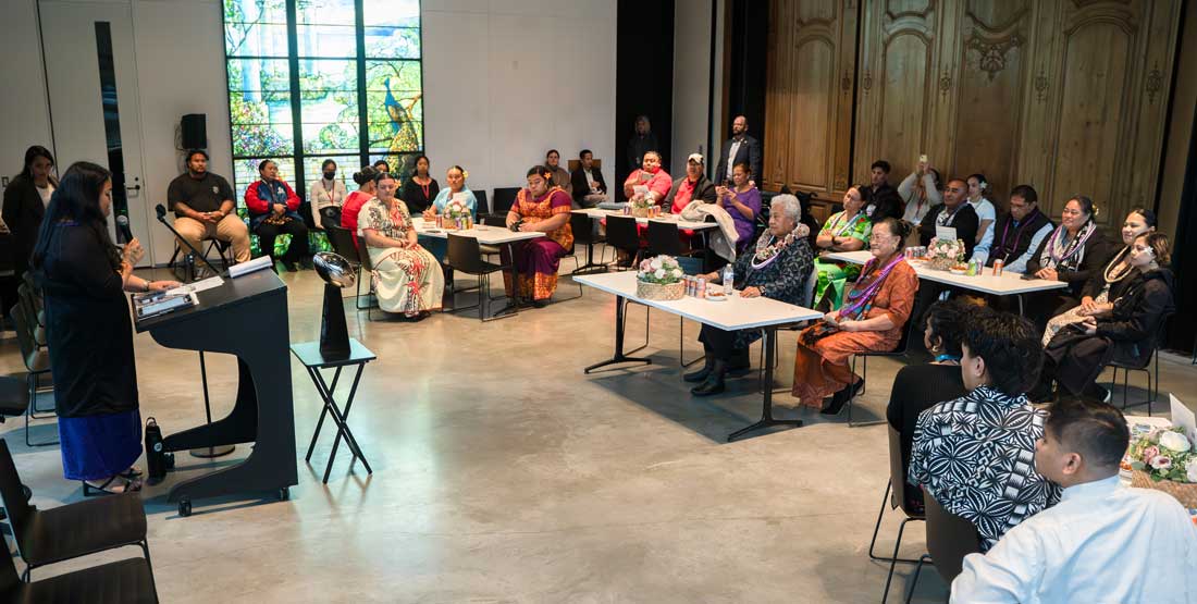 people gathered in the cascade room at the burke museum